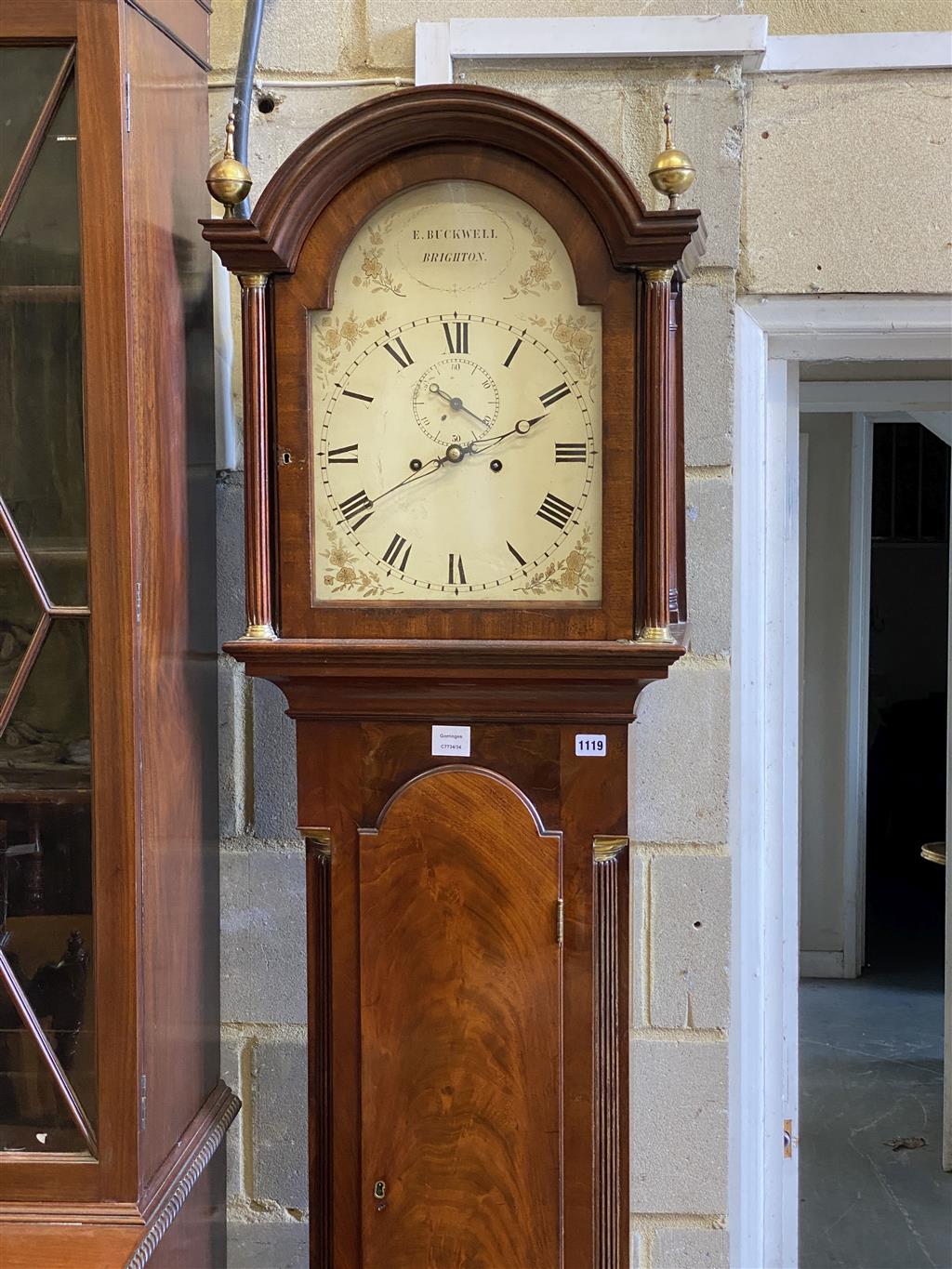E. Buckwell, Brighton. A late 18th century mahogany eight day longcase clock, with painted arched dial, height 222cm